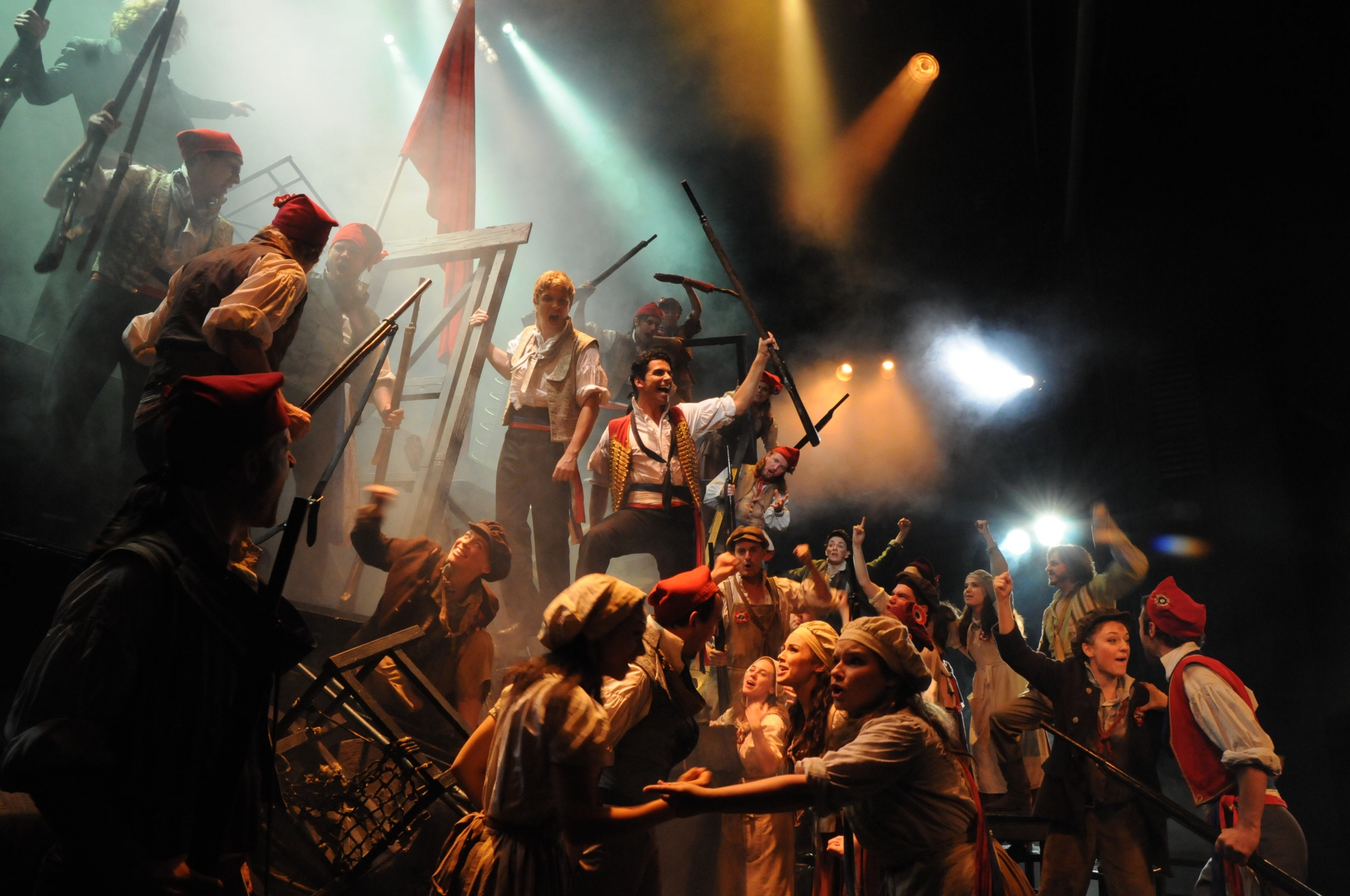
Liam Tamne as Enjolras with students on the Barricade, in Les Misérables
Photograph by Michael Le Poer Trench ©Cameron Mackintosh Ltd.  